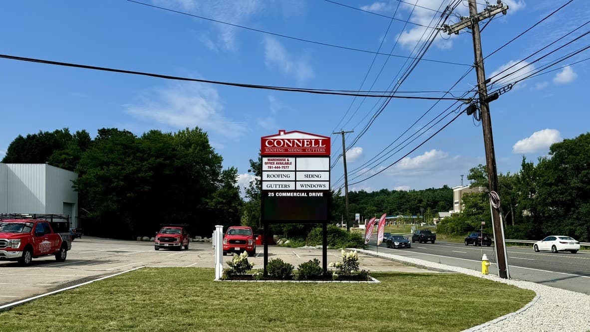 Landscaped roadside bed and maintained lawn at a business property
