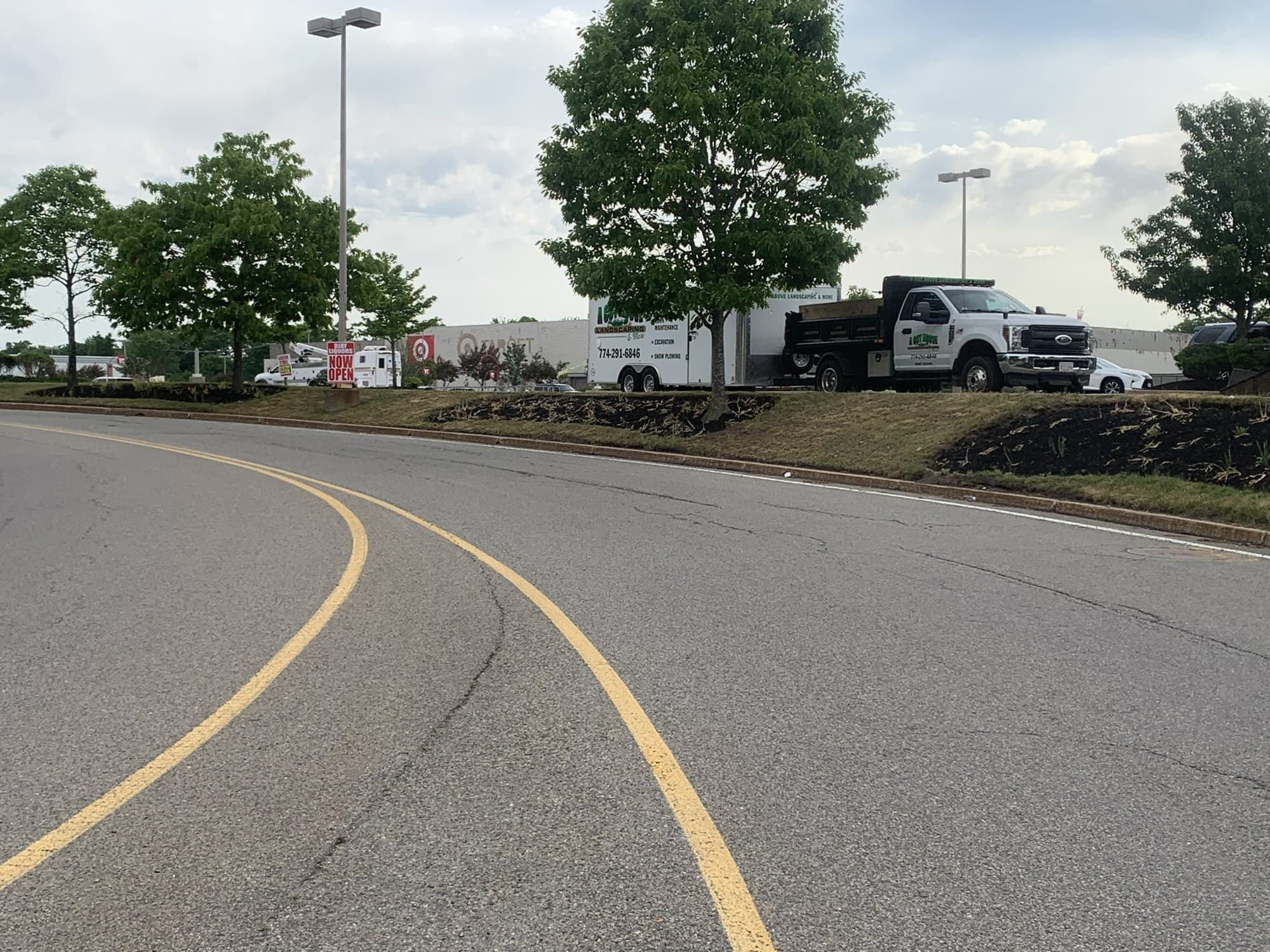 Clean paved access and landscaped edges at a commercial property