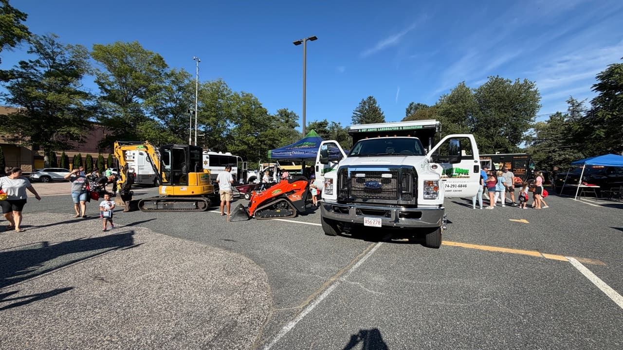 A Cut Above trucks and compact equipment on display at the 2026 Ashland Community Safety Night Out