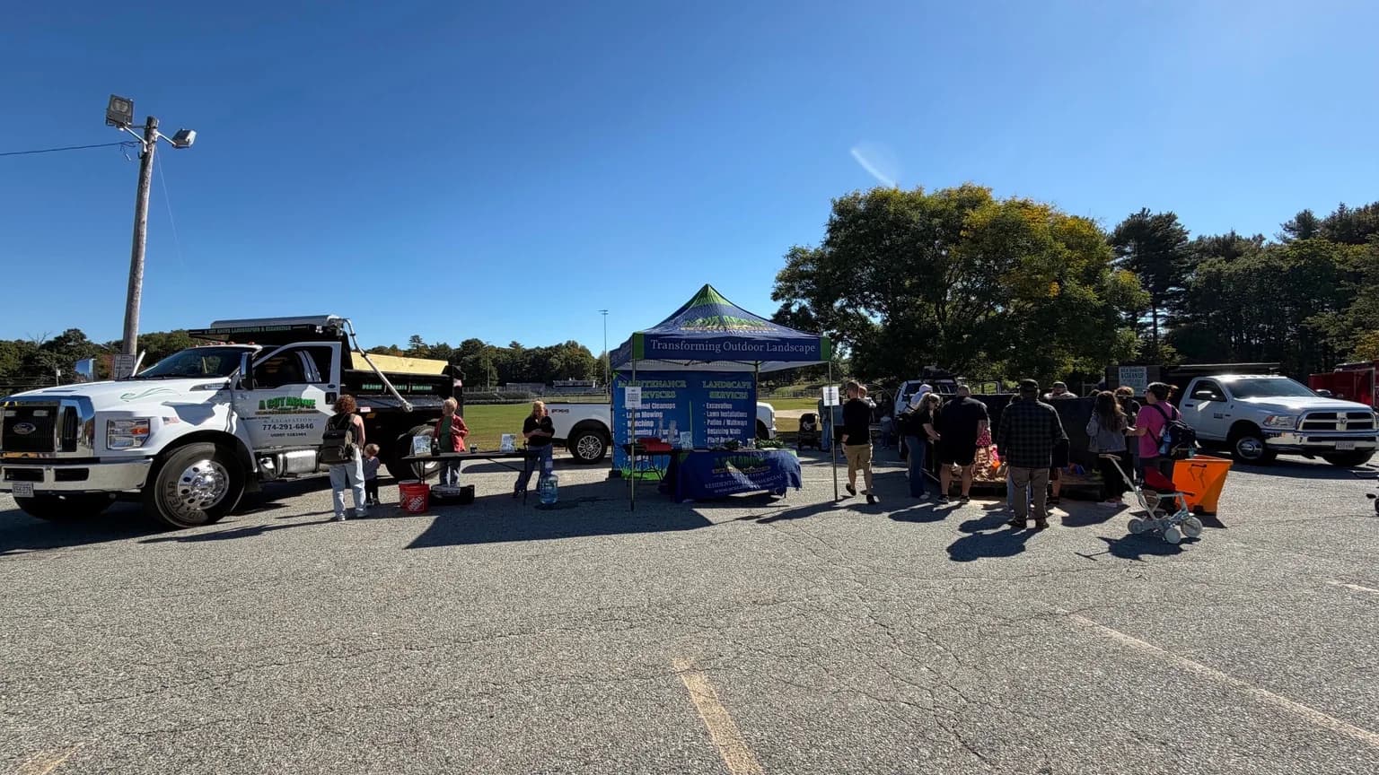 A Cut Above trucks and booth at The Morgan Mission's first annual Touch-a-Truck in Bellingham