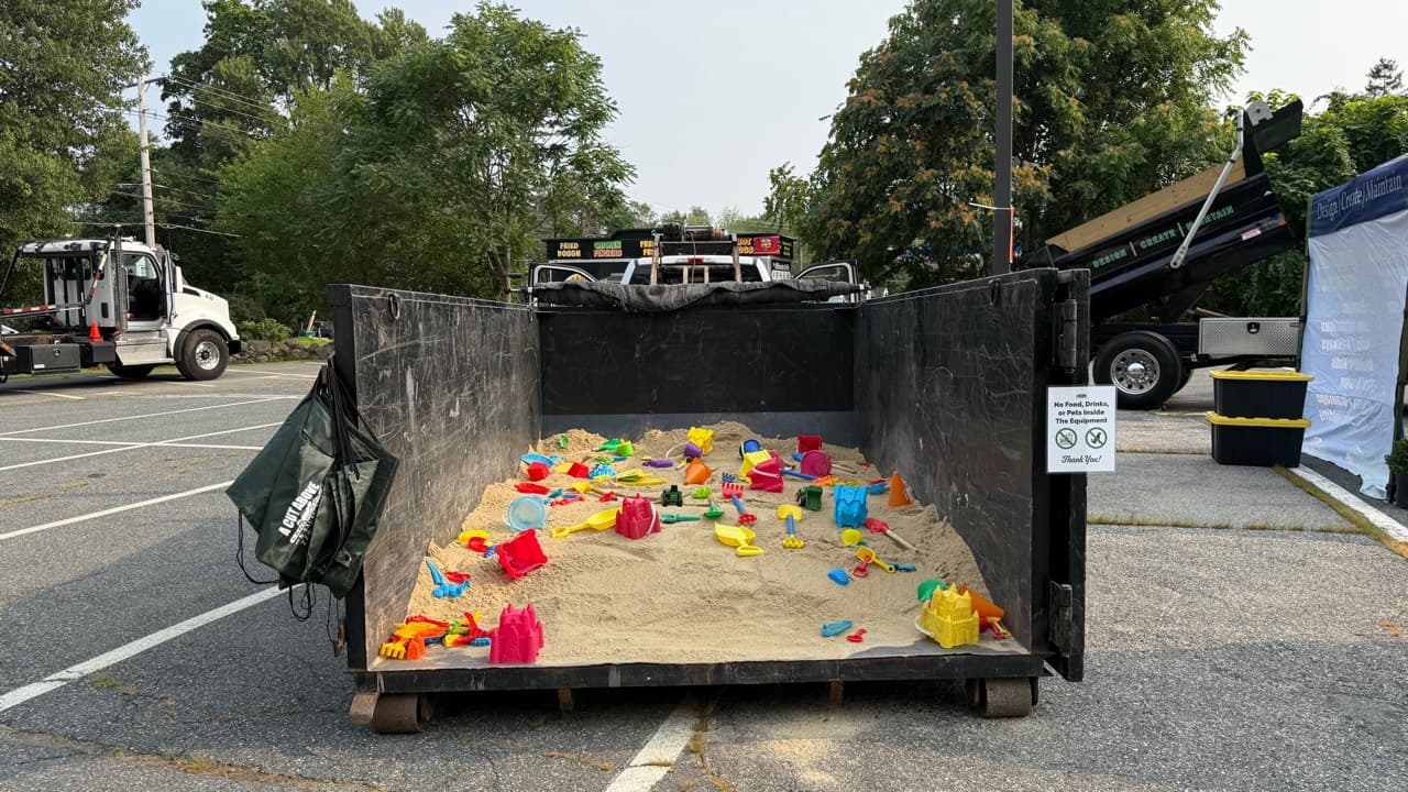 Children's sandbox activity at the A Cut Above display during the Ashland community gathering